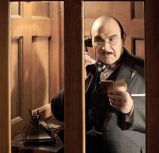 Hercule Poirot: Kissa kyyhkyslakassa